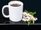 White coffee cup with cherry blossoms
