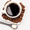 White coffee cup with coffee, plate with coffee beans and black teaspoon with sugar