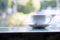 White Coffee Cup placing on table near window