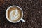 White coffee mug.  Coffee is a latte. table on the wooden table in vintage style, taken from the top view, see the froth of milk