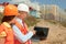 White-collar workers works on the building site