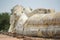 The white color large outdoor reclining buddha in Thailand at Wa