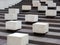 White Concrete Blocks on dark Granite Steps