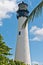 White, concrete, lighthouse, functioning as a navigational aid for ships