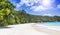 White coral beach sand and azure ocean. Seychelles islands.