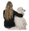 White Corded standard Poodle and a girl