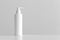 White cosmetic shampoo dispenser bottle mockup with blank copy space on a white table