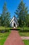 White countryside church in a lush green summer Sweden