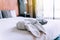 White couple towel in bedroom,Stack of plush hotel towels