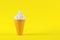 White cream toy on yellow background. Summer dessert