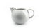 A white creamer on a white background, isolated