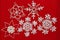 White Crocheted Snowflakes on Red