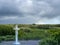 White cross in hill landscape