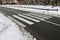 White crosswalk on a road in winter