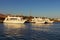 White cruise ships moored in the port in Dahab. Picturesque landscape of Red Sea with beautiful coastline.