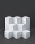 White cube boxes with dark blank wall background for display. 3D rendering.