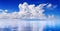 White cumulus clouds in blue sky over sea landscape, big cloud above ocean water panorama, seascape panoramic view, cloudy weather