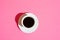 White Cup of Coffee with Saucer onNeon Fuchsia Pink Color Background. Morning Breakfast Energy Caffeine Addiction Fashion