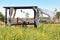 White curtain on a relaxing shelter in a meadow