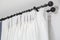 The white curtains with ring-top rail Curtain interior decoration