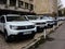 White Dacia Duster cars parked in line on street in Bucharest, Romania, 2019