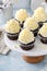 White and dark chocolate cupcakes with chocolate curls