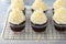 White and dark chocolate cupcakes with chocolate curls