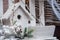 White decorative birdhouse for christmas decoration