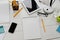 White designer table with a blank notepad