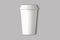 White Disposable paper Coffee cup with lid and round coaster mockup isolated on a grey background