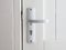 White door with chrome doorhandle