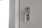 White door with security lock doorhandle