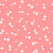 White dots and bones for dogs on pink background. Cute seamless pattern.