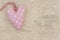 White dotted pink fabric heart