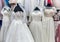 White dresses on mannequins in wedding salon