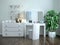 White dressing table with a chest of drawers