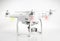 White drone quad copter with 4K digital camera.