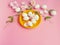 White Eggs on Yellow plate flowers  On Pink Background Ester Holiday Background Concept