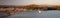 White egret flying over Santa Clara river jetty at Surfers Knoll in Ventura California USA