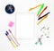 White electronic tablet and stationery, pens, paper clips, pencils and writing paper