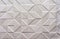 White embossed porcelain stoneware. Background and texture of porcelain tiles