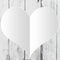 White empty heart shape on a light distress wood background