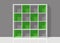 White empty square bookshelf with green elements on grey wall ba