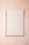 White empty template picture frame on textured bright, cream and peach background, top view