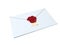 White envelope sealed with red wax