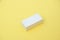 The white eraser   isolated in yellow background