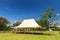 White events tent in the field.