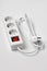 White extension cord for three sockets witn illuminated power circuit breaker