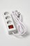 White extension cord for three sockets witn illuminated power circuit breaker