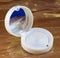 White eye shadow in mirror container